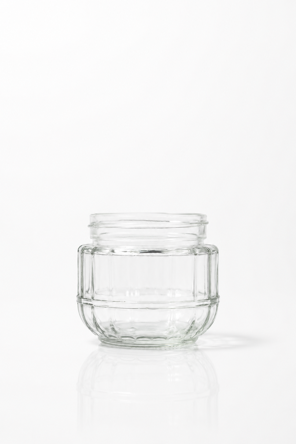 Clear Paneled Glass Storage Jar